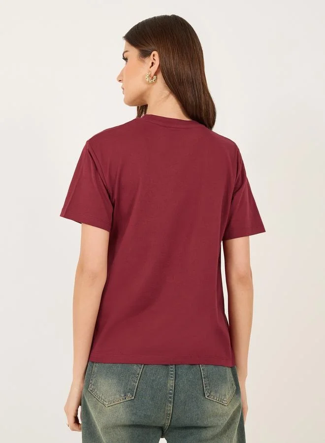 Styli Embroidered Slogan Relaxed Fit Round Neck T-Shirt