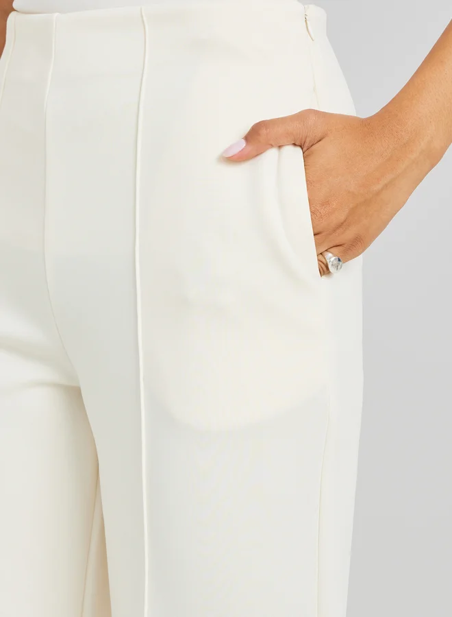 Styli Pin Tuck Detail Slit Hem Straight Knit Pants