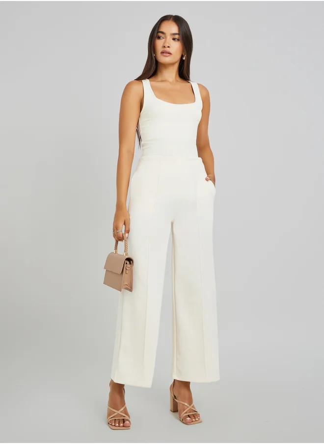 ستايلي Pin Tuck Detail Slit Hem Straight Knit Pants