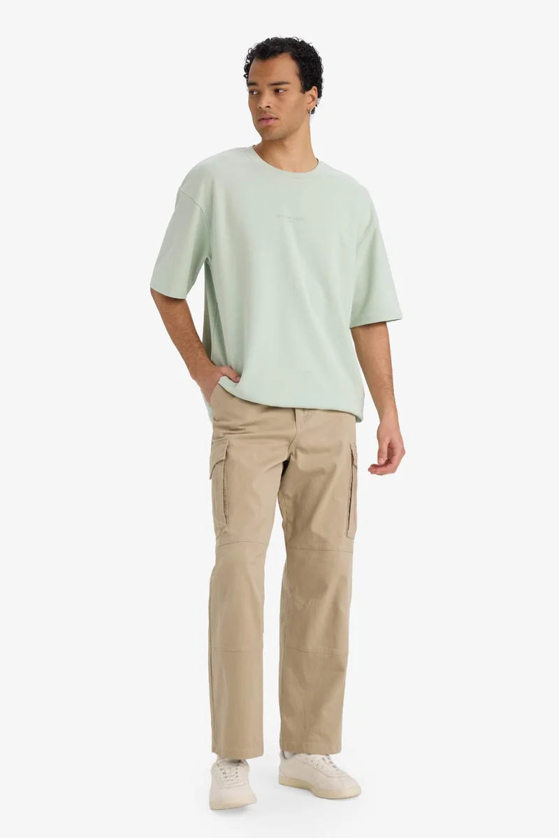 ديفاكتو Boxy Fit Crew Neck Short Sleeve T-Shirt