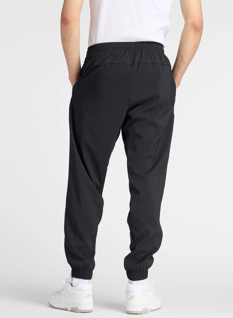 New Balance Reimagined Woven Sweatpants