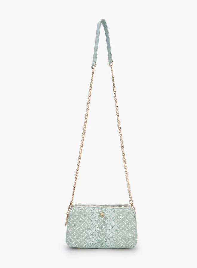 فلورا بيلا من شو إكسبرس حقيبة كروس بودي فلورا بيلا بطبعة شعار مع حزام سلسلة