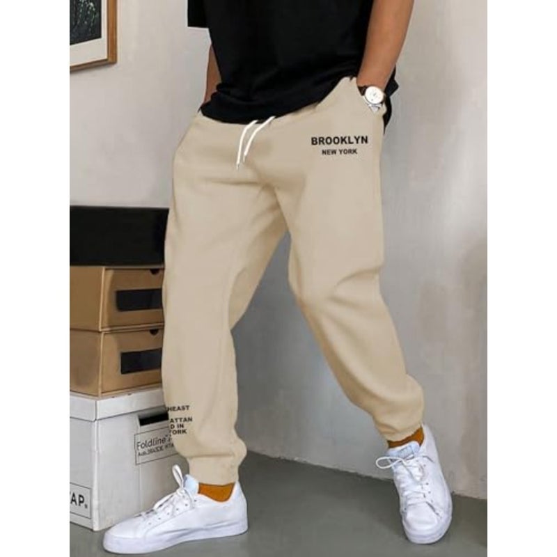 High-rise joggers for men, polyester blend, black, moisture-wicking and stretchable - Image 2