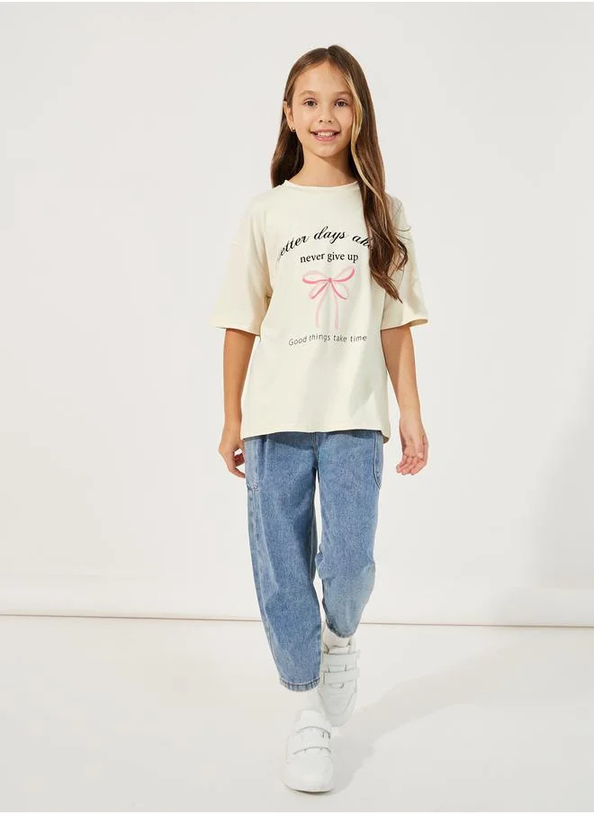 Styli Slogan Print Round Neck Oversized T-Shirt