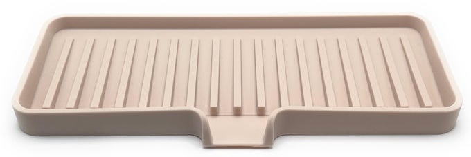 SILICONE SOAP DISH TRAY AND SPONGE HOLDER WITH DRAIN CHUTE BATHROOM AND KITCHEN SINK ORGANIZER CADDY 9X35 SAND DOLLAR 56 OUNCES