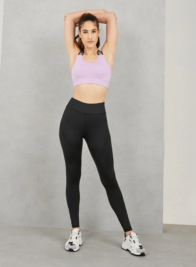 Styli Pack of 3 - Mesh Back Detail T-Shirt Crossback Strap Sports Bra and Stitch Detail Legging Active Set