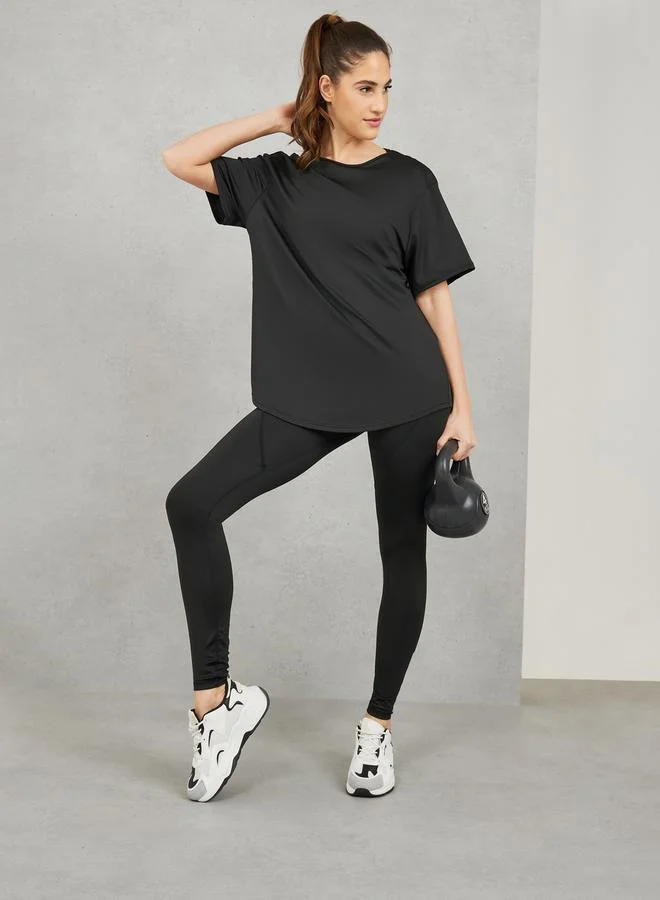 Styli Pack of 3 - Mesh Back Detail T-Shirt Crossback Strap Sports Bra and Stitch Detail Legging Active Set