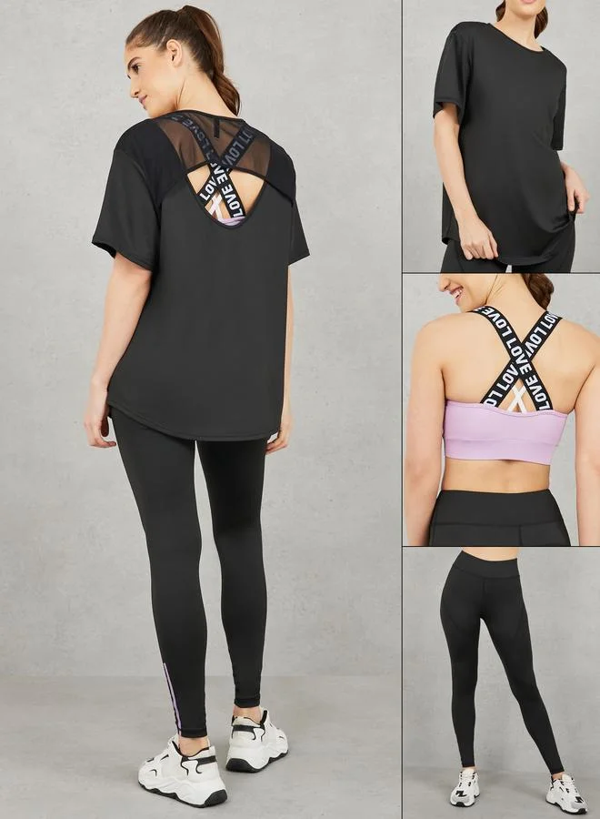 ستايلي اكتيف طقم رياضي: حمالة صدر رياضية بحمالات متقاطعة ونسيج شبكي من الخلف مع بنطلون ليجنز بتفاصيل خياطة (عبوة من 3)