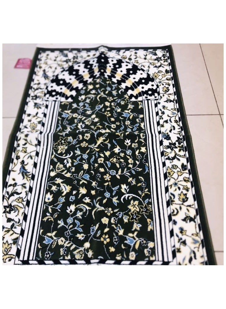 A prayer rug that imitates the carpets of Al Rawdah Al Sharifa in green characterized by a thickness of 4 mm We offer it at a great and special price Size 110*70 - Image 1