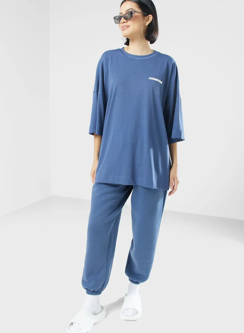 The Giving Movement Exaggerated Racer Printed T-Shirt