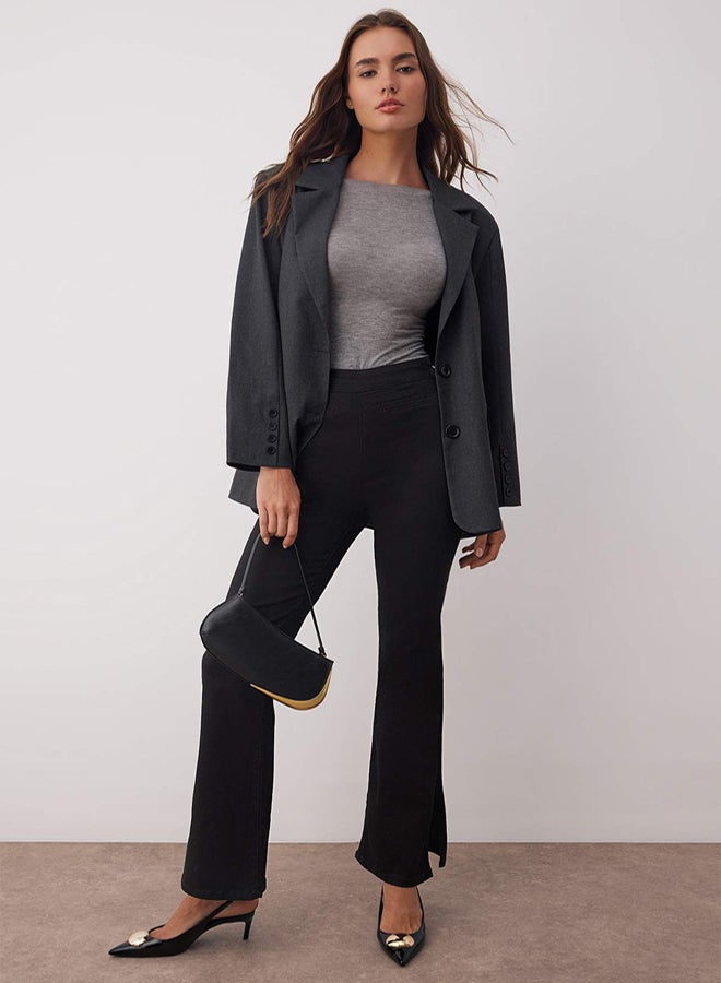 trendyol Black Waist Detailed High Waist Comfort/Flexible Flared Y Slit F Flare Jeans - Image 1