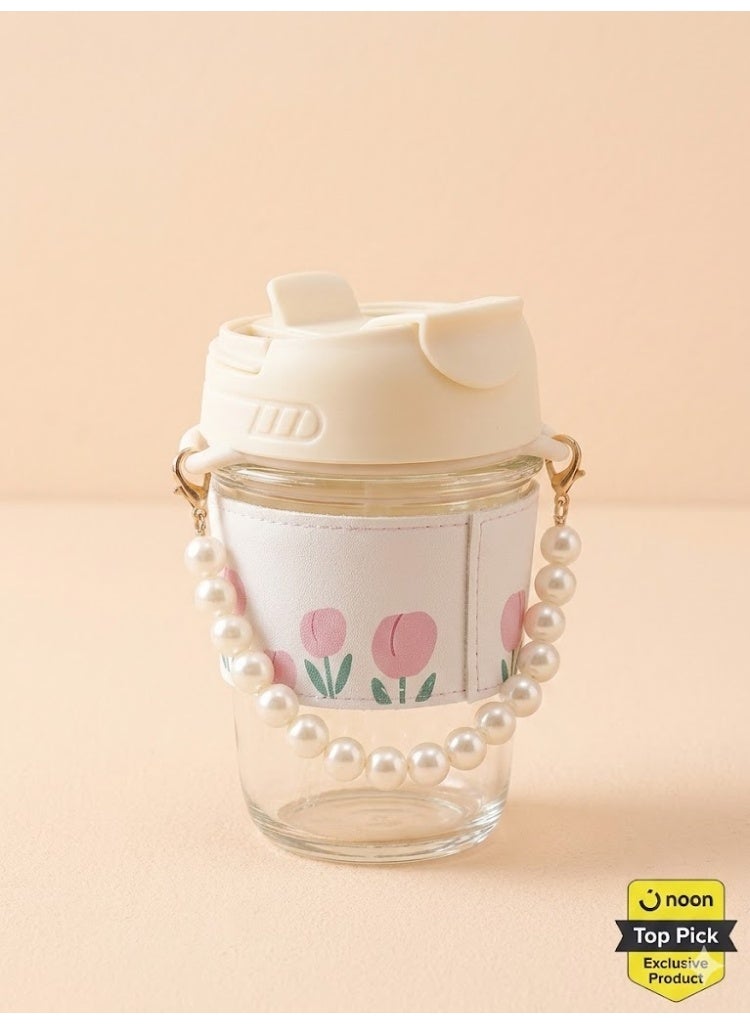 Portable glass beverage mug with a tight-fitting lid and elegant pearl holder - Clear glass mug with a pink tulip patterned leather case - Perfect for coffee, the office, and encouraging drinking - Cream color