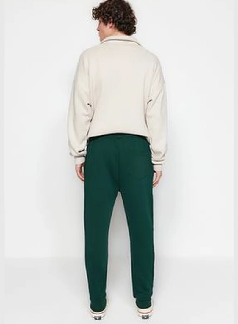 trendyol Men's Green Regular/Regular Fit Geometric-Texture Embroidered Drawstring Elastic Leg Sweatpants.