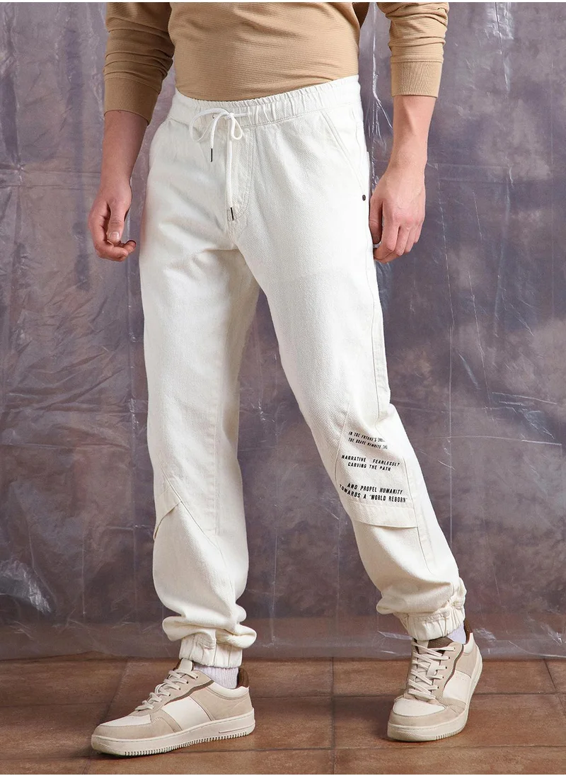 Hubberholme Ecru Straight Fit Jeans Washed design crafted from 100% Cotton with Elasticated closure.