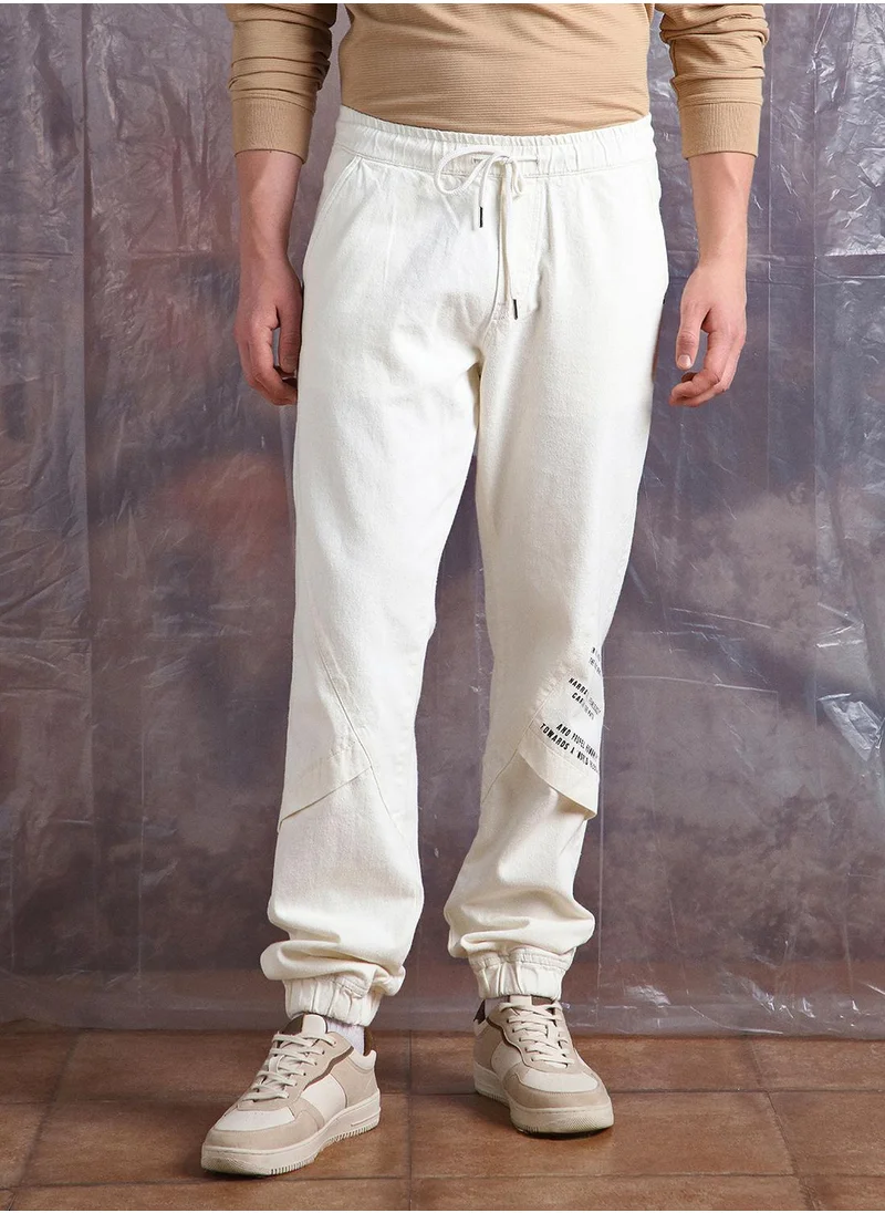 Hubberholme Ecru Straight Fit Jeans Washed design crafted from 100% Cotton with Elasticated closure.