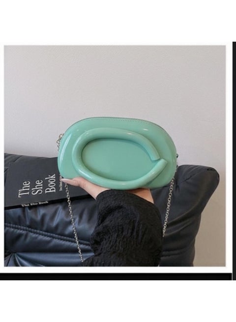 Trendy mini women’s bag made from durable high-quality silicone with a modern glossy design. Lightweight and easy to carry, featuring a stylish metal chain for crossbody or shoulder wear. Small yet practical, perfect for daily outings and adding a chic modern touch to any outfit.