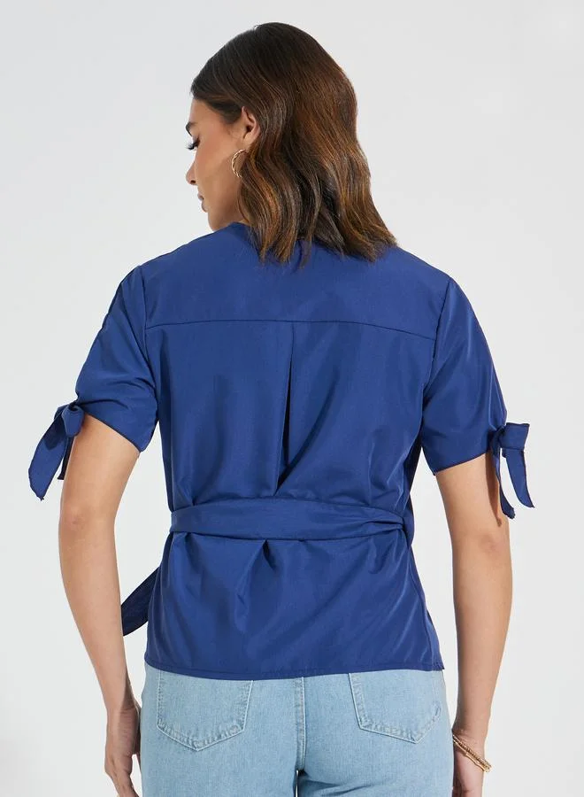 Styli Solid Wrap Top with Tie-Cuff Detail
