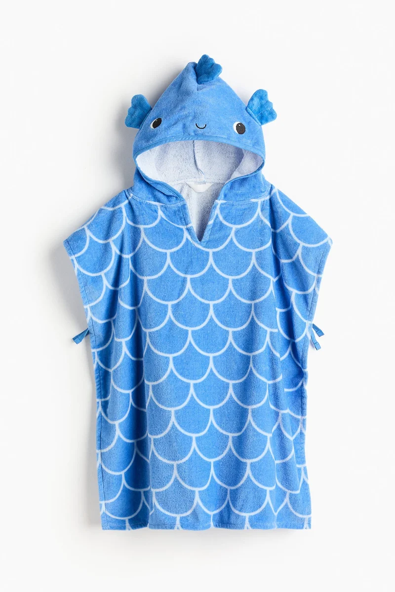 اتش اند ام منشفة بتصميم بونشو