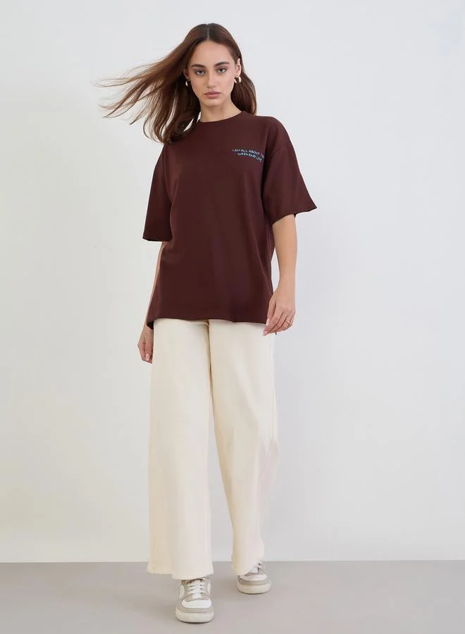 Styli Brown Embroidered Slogan Oversized T-Shirt
