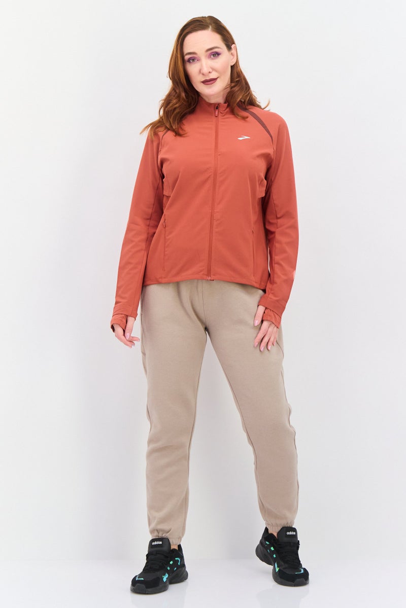 Brooks جاكيت تدريب طويل الأكمام للنساء، رياضي، لون نحاسي أحمر - Image 2