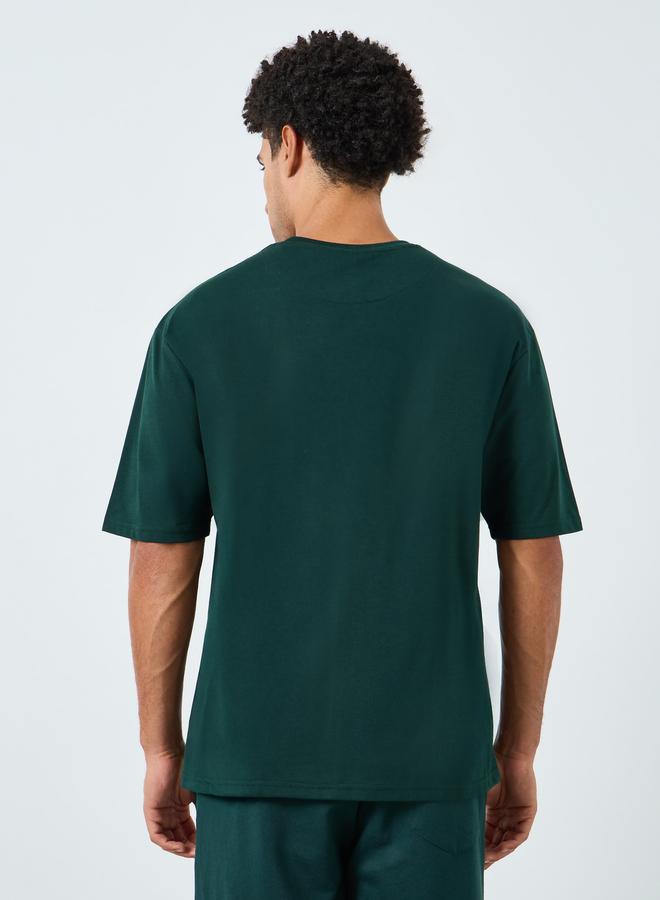 Styli Men Green Graphic Print Oversized T-Shirt - Image 4