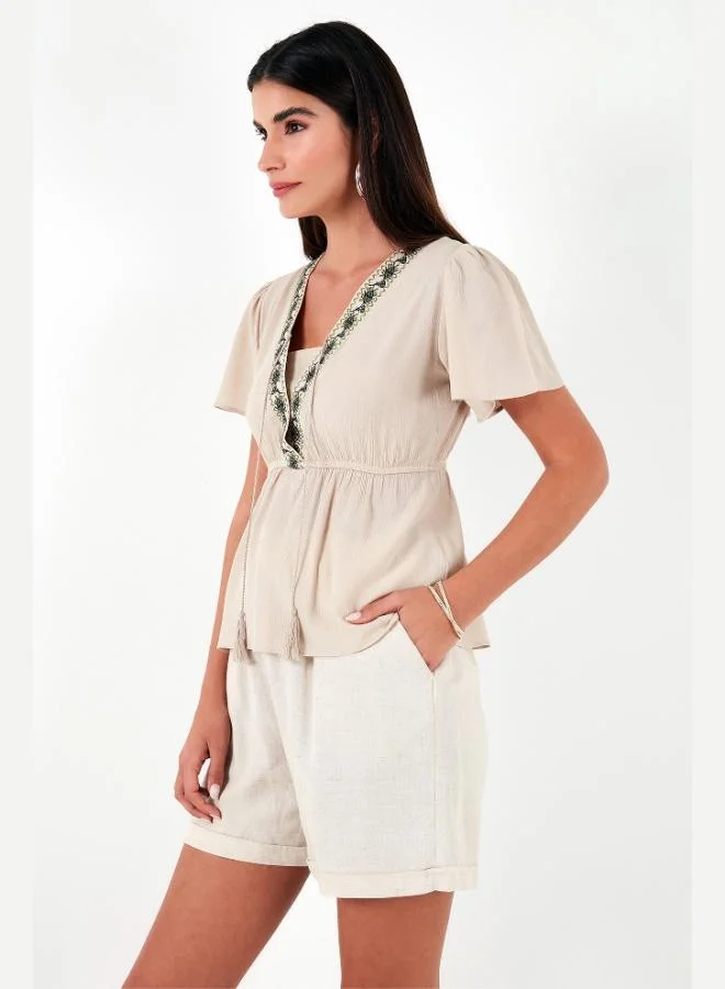 ليلا بلوزة قطنية ليلى مطرزة بشراريب بقصة عادية للنساء