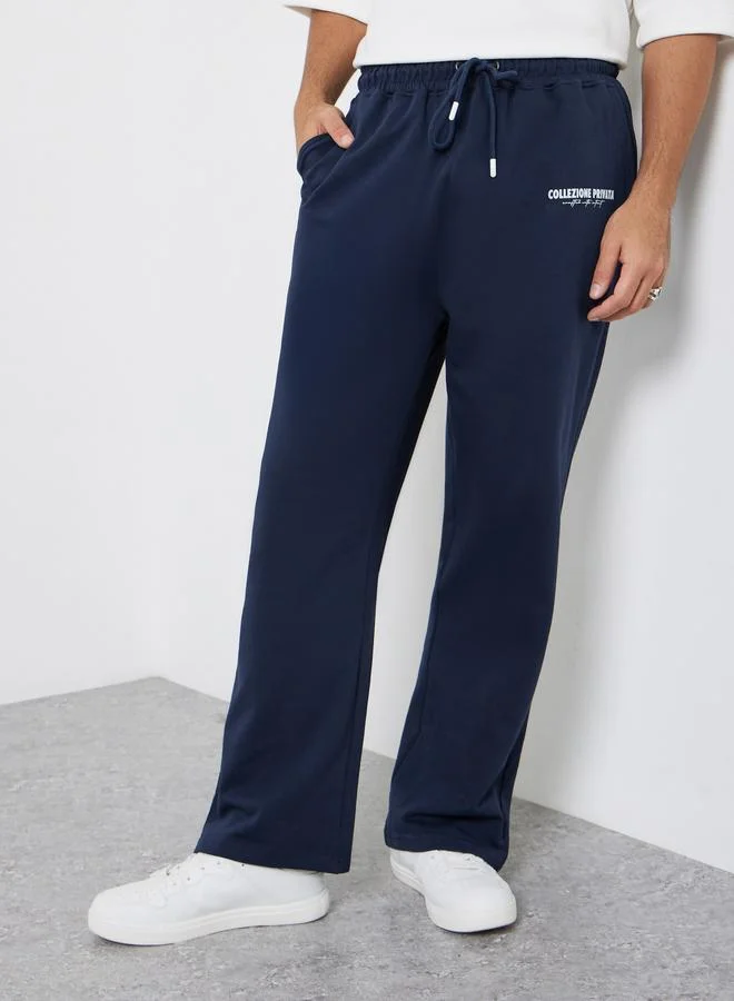 Men Navy Blue Slogan Oversized Joggers