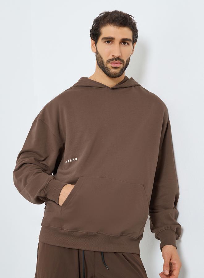 Styli Men Brown Printed Oversized Hoodie - Image 1