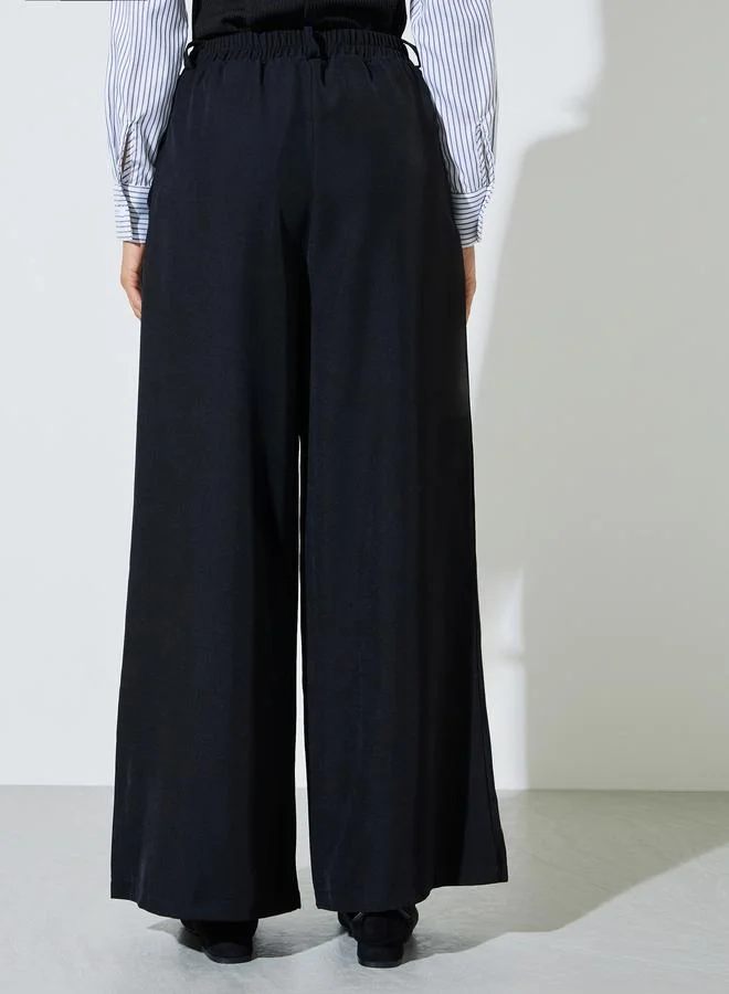 Styli  Black Wide Leg With Pleat Detailing Formal Pants for Women | Best Price UAE