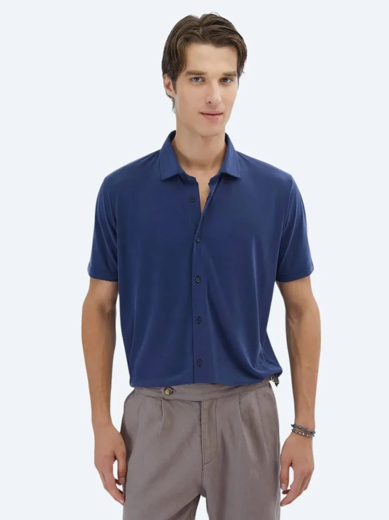 كيب قميص كاجوال محبوك بلون نيلي سادة بقصة عادية