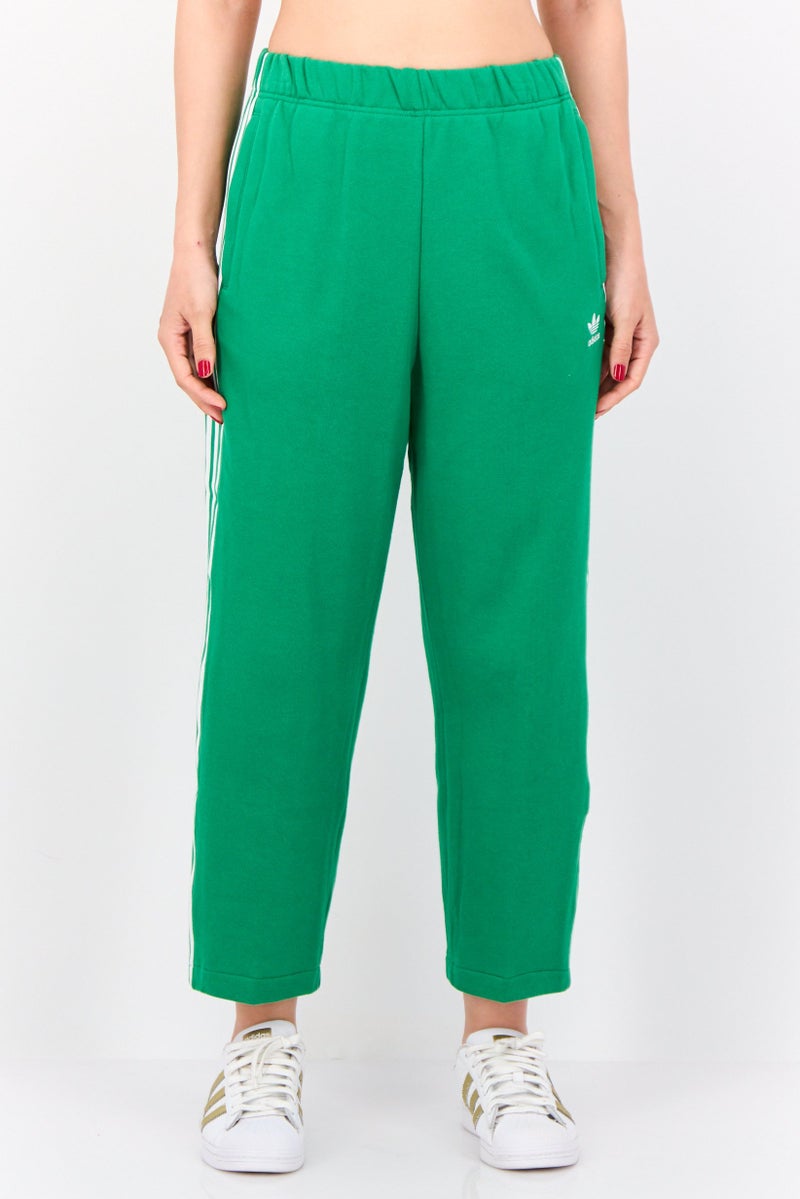 adidas Originals Women Sportswear Fit Brand Logo Outdoor Sweatpants, Green  - Image 1