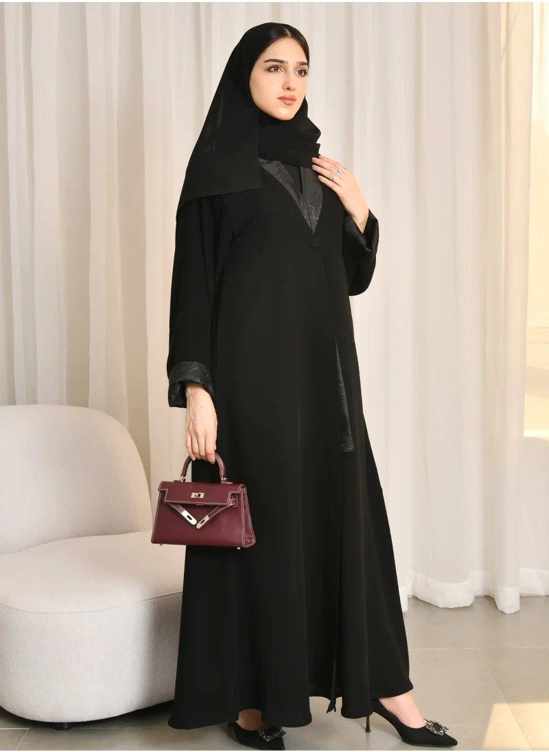 HAWRAA ABAYA Black abaya with summer jacquard overlay on the inner collar and double sleeves