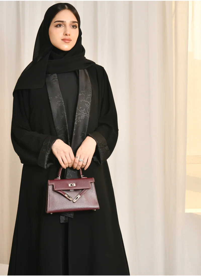 HAWRAA ABAYA Black abaya with summer jacquard overlay on the inner collar and double sleeves