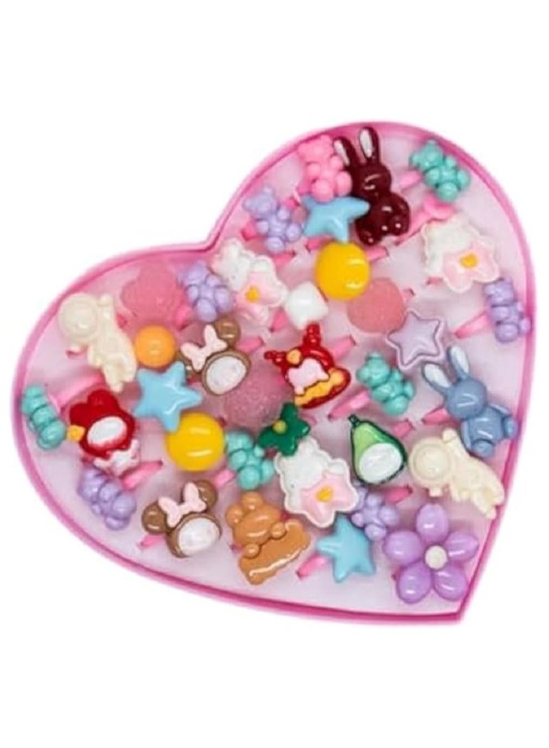 Girls ring set with a box of 36 free-size hypoallergenic rings in multiple designs made of PVC plastic, matching finger sizes, gift for women and girls in  - Image 1