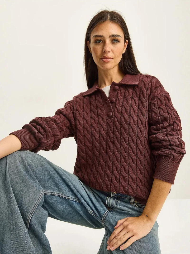 بيانكو لوتشي كنزة بولو برقبة سميكة بنقش ضفيرة من لوتشي