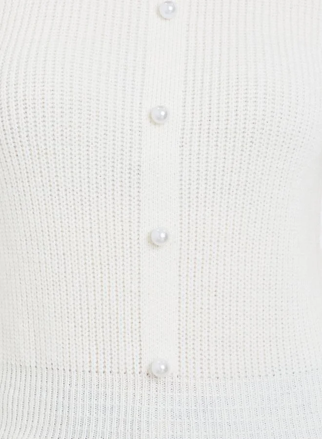 Take Two Solid Button Front Ruffled Hem Sweater