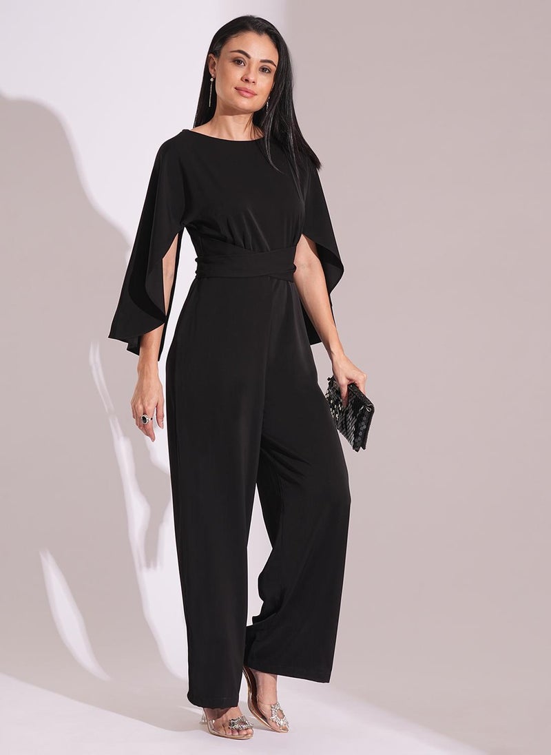 Globus Women's Black Party Jumpsuit with Boat Neck Cape Sleeves and Waist Tie Up - Image 1
