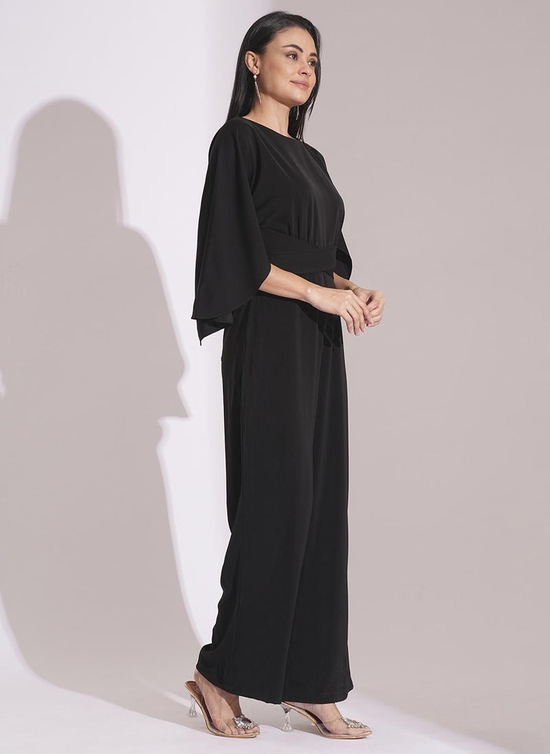 Globus Women's Black Party Jumpsuit with Boat Neck Cape Sleeves and Waist Tie Up - Image 3