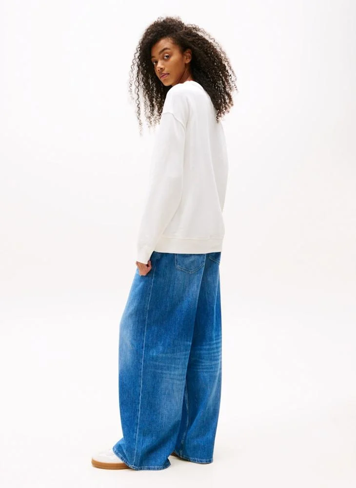 تومي جينز بلوزة قطنية برقبة دائرية برسومات