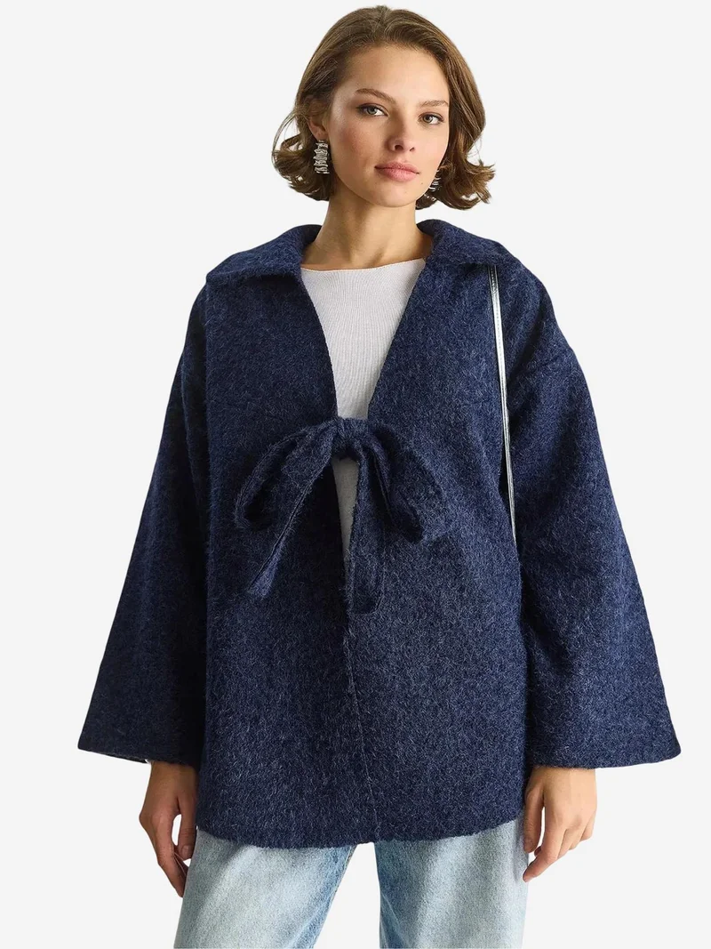 بيانكو لوتشي كارديجان فضفاض بياقة على شكل حرف  مع رباط