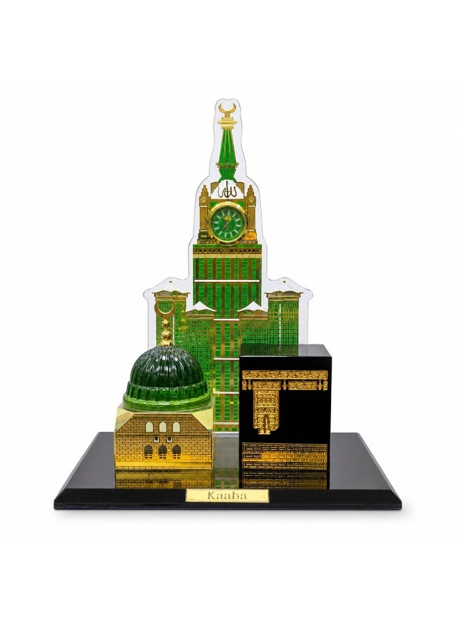 A luxurious work of art crafted from high-quality crystal glass, this piece features a model of the Holy Kaaba and the Prophet's Mosque (Al-Rawdah Al-Sharifah) with an elegantly designed clock tower. It adds a distinctive spiritual touch to living rooms, offices, and shelves. The model measures 15 x 11 cm, and the clock tower is 16 cm tall. It comes in a gift-ready box. - Image 1