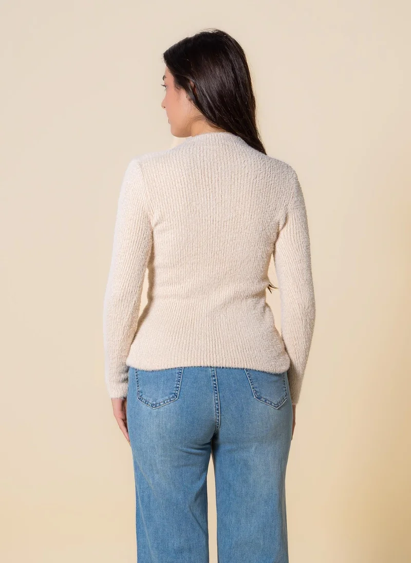 SHAPES DETAILED KNIT HIGH NECK TOP