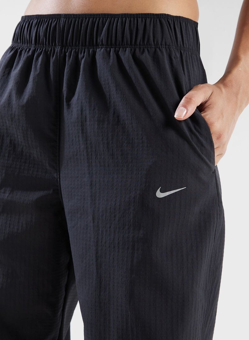 نايكي 7/8 بنطال رياضي دافئ متوسط الارتفاع من Fast Dri-Fit - Image 3