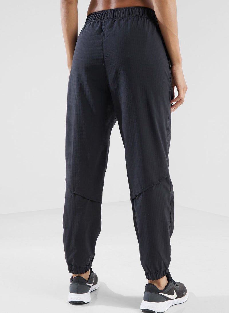 نايكي 7/8 بنطال رياضي دافئ متوسط الارتفاع من Fast Dri-Fit - Image 2