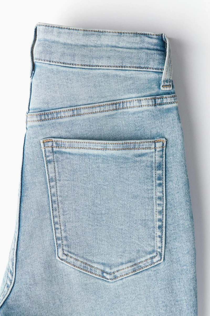 اتش اند ام جينز بقصّة سكيني وخصر عالي