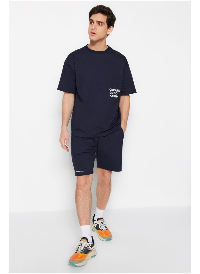 trendyol Navy Blue Tracksuit Relaxed/Comfortable Cut Text Printed Cotton TMNSS23EM00001  - Image 2