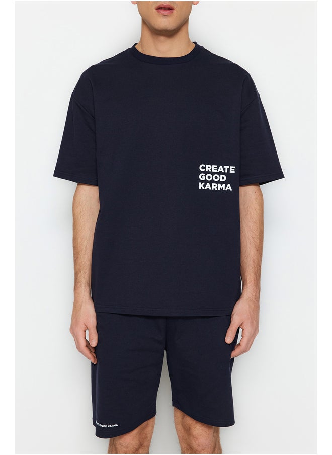 trendyol Navy Blue Tracksuit Relaxed/Comfortable Cut Text Printed Cotton TMNSS23EM00001  - Image 3
