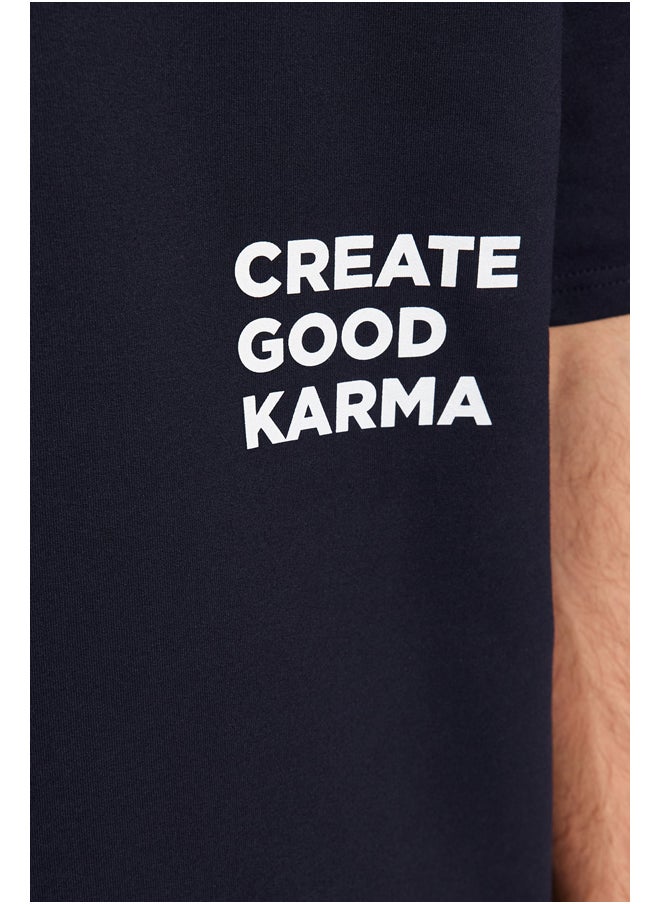 trendyol Navy Blue Tracksuit Relaxed/Comfortable Cut Text Printed Cotton TMNSS23EM00001  - Image 4