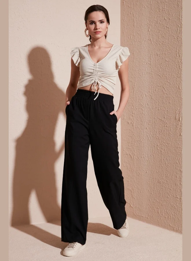 ليلا بلوزة نسائية ليلى بقصة ضيقة وأكمام مكشكشة وتفاصيل مجمعة