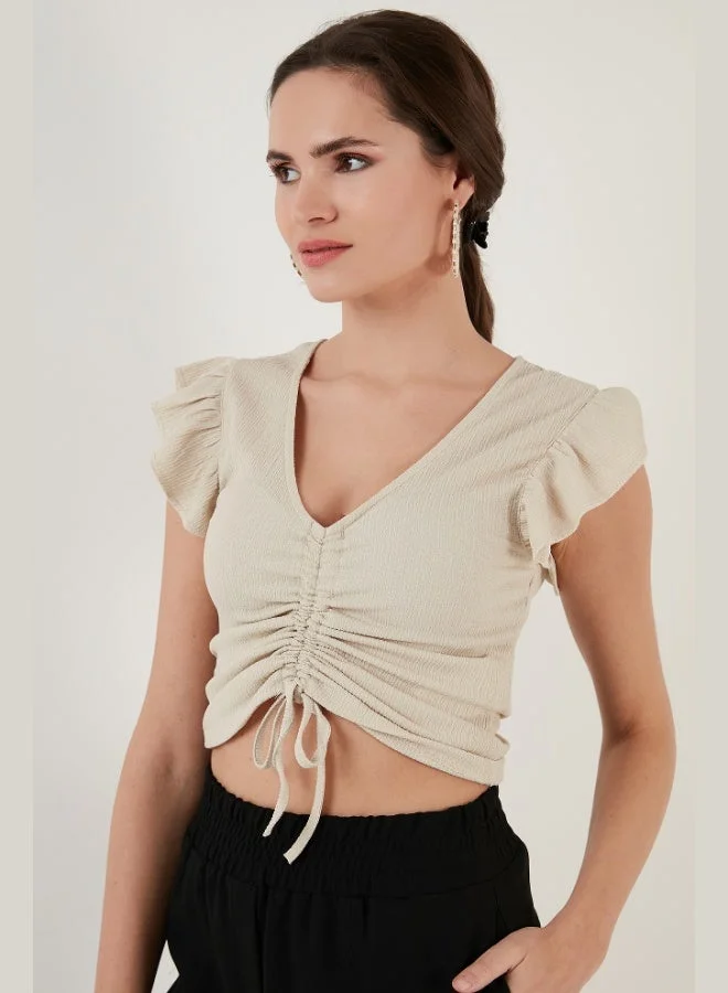 ليلا بلوزة نسائية ليلى بقصة ضيقة وأكمام مكشكشة وتفاصيل مجمعة